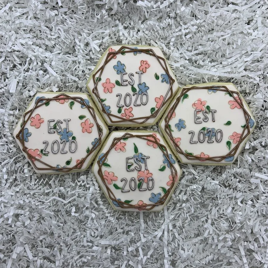 Hexagon cookies with piped flowers and EST 2020